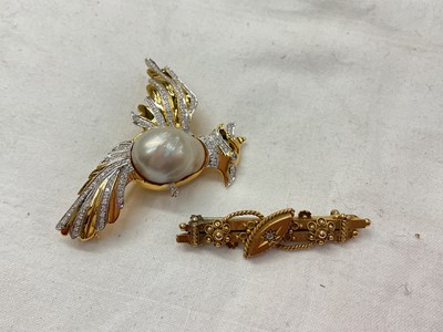 Lot 951 - Diamond and cultured pearl bird brooch and a Victorian 15ct gold bar brooch (2)