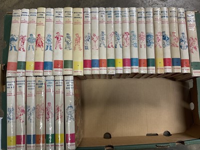 Lot 1389 - Richmal Crompton - Collection of Just William books, 1950s reprints with coloured band spines (29)