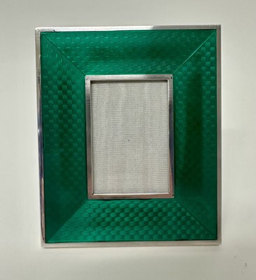 Lot 110 - Good quality Italian silver (925) and green guilloche enamel photograph frame, with leather easel back, 12cm x 10cm