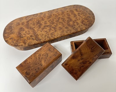 Lot 112 - Pair of Thuya Burl wood trinket boxes together with a larger oval box (3)