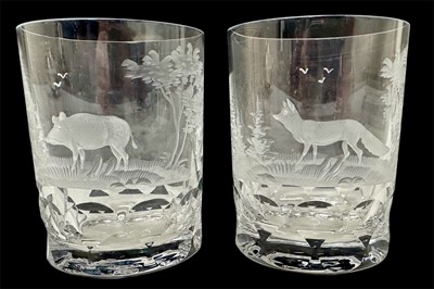 Lot 142 - Pair of good quality cut and etched glass tumblers with scenes depicting a fox and boar in landscape, 9.5cm high