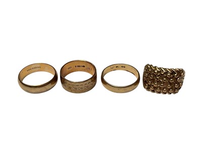 Lot 271 - Four 9ct gold rings to include three wedding band and a knot ring