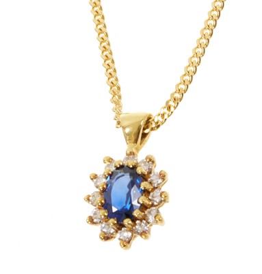Lot 502 - Sapphire and diamond cluster pendant on 18ct gold chain