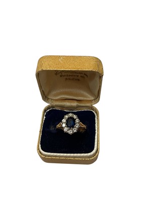 Lot 280 - Sapphire and diamond cluster ring in 18ct gold setting