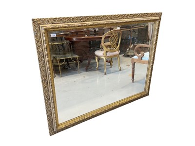 Lot 5388 - Decorative gilt framed wall mirror with bevelled plate 110 x 140cm