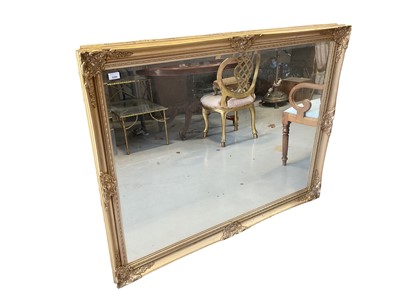 Lot 5389 - Decorative gilt framed wall mirror with bevelled plate 106 x 136cm