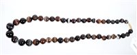 Lot 563 - Banded agate necklace with a string of...