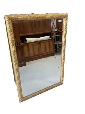 Lot 5391 - Decorative gilt framed wall mirror with bevelled plate 101 x 69.5cm