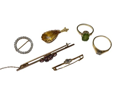 Lot 288 - 18ct gold diamond single stone ring, 9ct diamond set circular brooch, Edwardian 9ct gold pink stone bar brooch, one other Edwardian brooch marked 14k, peridot ring and a citrine pendant both in...