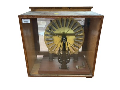 Lot 3024 - 20th century Wimshurst machine / electrostatic generator in glazed oak case.