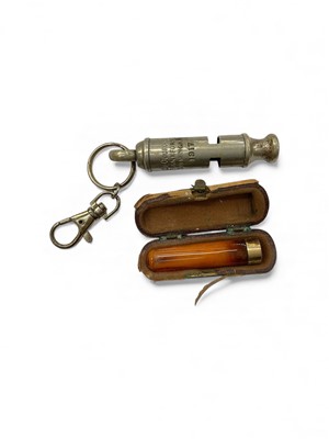 Lot 100 - WWI period whistle by A.De Courcy &Co. 1917, together with an amber cigarette holder