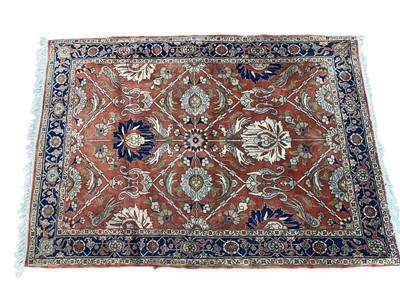 Lot 5410 - Eastern rug on orange and blue ground. Measurements 149cm x 107cm