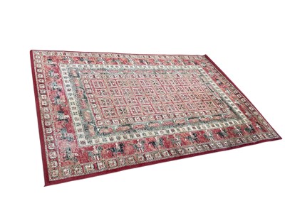 Lot 5411 - Mastercraft Kashqai wool rug on red and cream ground with animal decoration. Measurements 238cm x 161cm