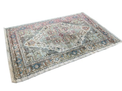 Lot 5412 - Large rug on beige, green and red ground with central medallion design. Measurements 300cm x 200c