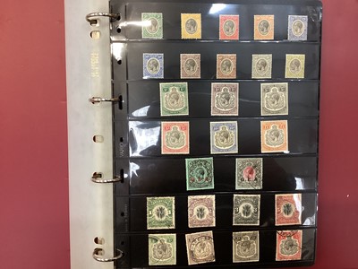 Lot 1196 - Stamps - East Africa selection in album including K.U.T. definitives GV to £1 mint, Giraffes to 5/- used, GVI to £1 mint definitives set, QEII to £1 mint, Bermuda key types, Bahamas & St Vin...