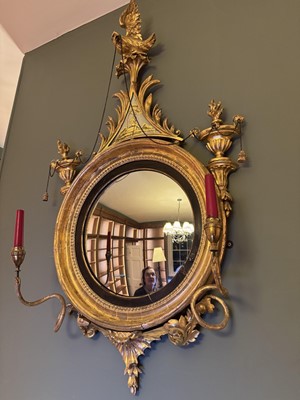 Lot 1281 - Regency circular gilt convex girandole wall mirror with ornate cresting