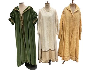 Lot 2571 - Tudor Costume professionally made consisting of womens loose gowns X2 one in green velvet with braid trim, the other gold brocade with cream lining and a kirtel (under dress) in heraldic figured...