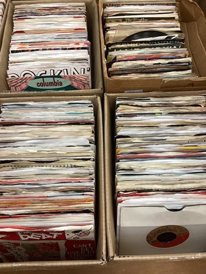 Lot 2724 - Four boxes of single records with centres removed for use on a jukebox. Three of the boxes in the lot have the title strips in the sleeves with the artist, A side and B side indicated. Singles r...