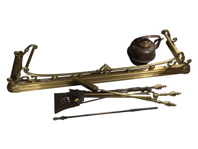 Lot 5137 - Victorian brass fender together with other fire tools
