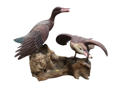 Lot 5139 - A large wooden sculpture of two ducks