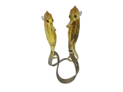 Lot 2374 - Swarovski Crystal Paradise Collection pair of Seahorses light topaz, boxed