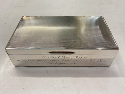 Lot 939 - 1970s silver cigarette box with engine turned decoration and presentation engraving (Birmingham 1973)