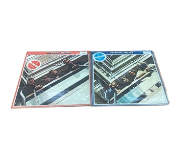 Lot 2767 - Two rare limited edition vinyl records, 'The Beatles/1962-1966 Red Vinyl 2 Discs' and 'The Beatles/1967-1970 2 Blue Discs' in original sleeves and cases.
