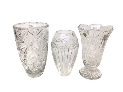 Lot 2394 - Waterford Crystal Seahorse vase, 25cm high, together with another Dolman pattern vase, 23cm high and one other cut glass vase (3)