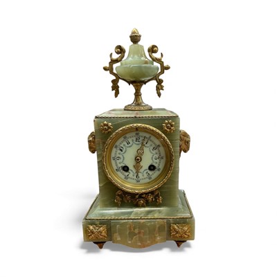 Lot 3106 - Late 19th century green onyx cased mantle clock with gilt metal mounts and rams head handles, French movement striking on bell 32cm high