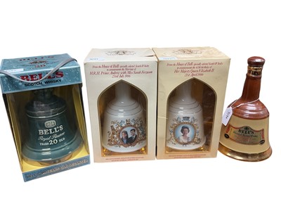 Lot 3097 - Four Bell's Old Scotch Whisky 75cl Bottles, 20 year old decanter, 1986 Royal Wedding, 1986 Queen Elizabeth II 60th Birthday and another unboxed (4).