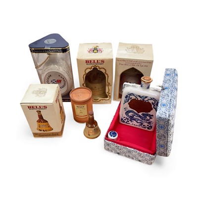 Lot 3098 - Seven assorted bottles of whisky and other spirits to include Bell's Old Scotch Whisky 50cl Bottles x2, 18.5cl bottle x1 5cl bottle x1, another Bell's bottle, 1986 Commonwealth Games Dimple Souv...