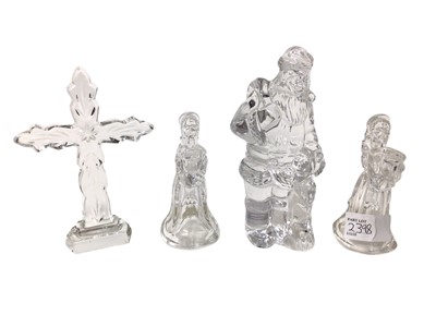 Lot 2398 - Waterford Santa Claus together with two small Angels and a Cross (4)