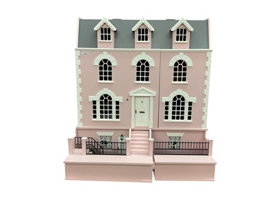 Lot 2122 - Large four storey dolls house, pink in colour with contents, Terrace View Cafe, The Garden Bakery, The Hair Gallery, Nina's Nails, Old Roof Tree Conservatory Bar. All of the above items have an...