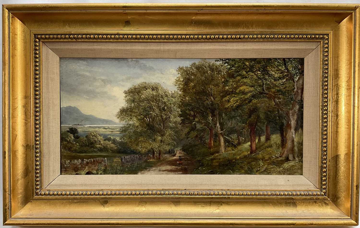 Lot 28 - English School, 19th century, oil on board, signed A. Vickers, figures on a track on the edge of woodland in mountainous landscape, 17cm x 35cm, gilt frame