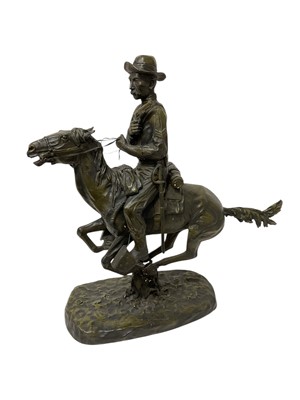 Lot 885 - Large bronze figure of an American cavalryman on horseback, 66cm high