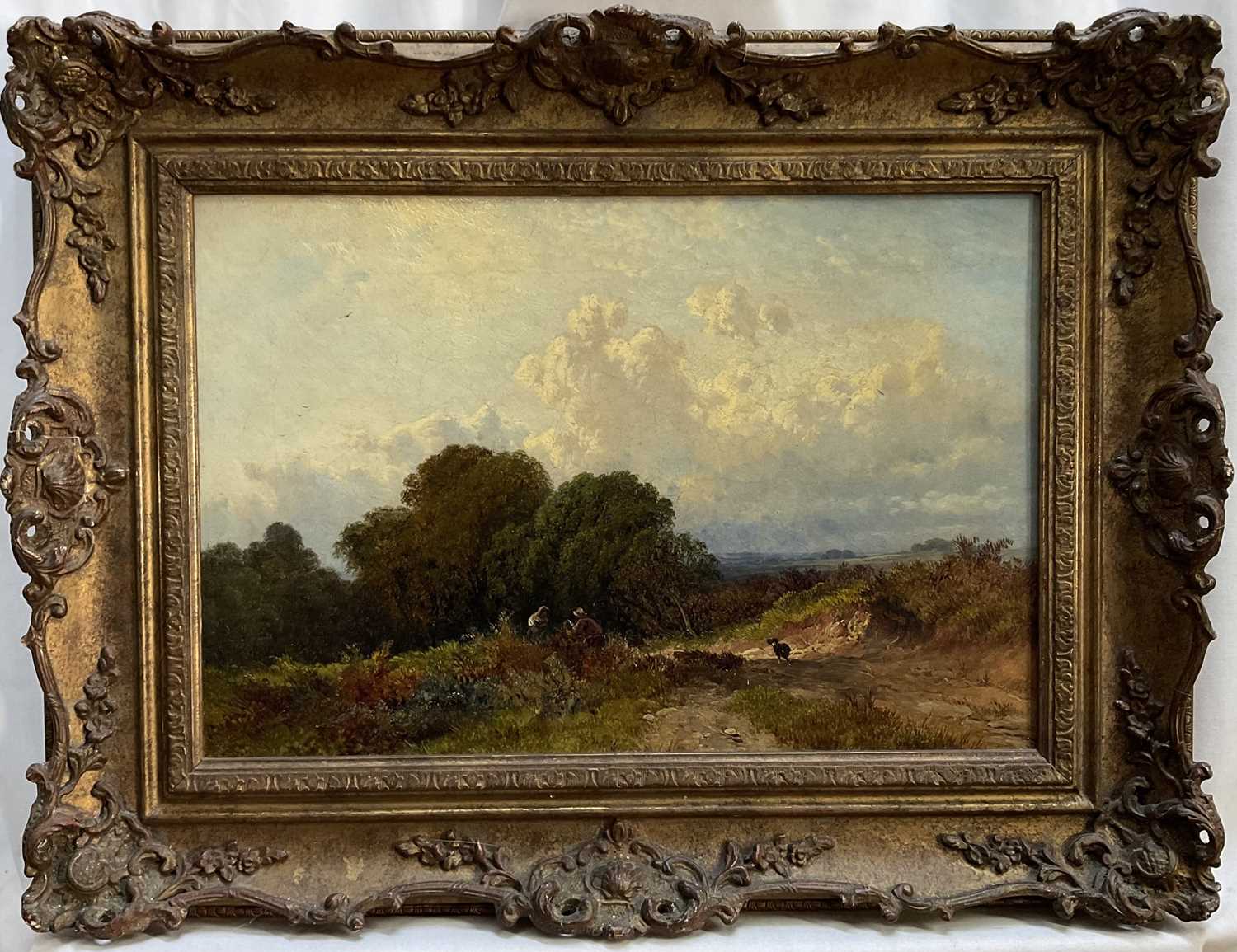 Lot 67 - Caroline Fanny Williams (1836-1921) oil on canvas, rural landscape with two figures and their dog, 26cm x 39cm, gilt frame