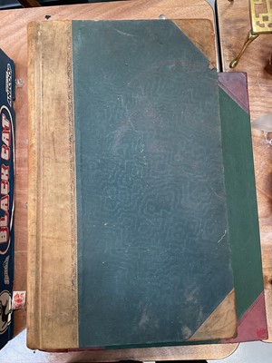 Lot 5014 - Large antique leather bound account book of local interest, and another similar book with blank pages (2)