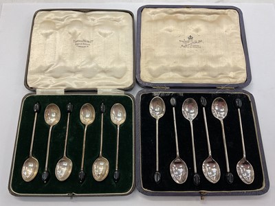 Lot 986 - Set of six Mappin & Webb silver coffee bean end spoons in fitted cased, and another silver plated set (2)