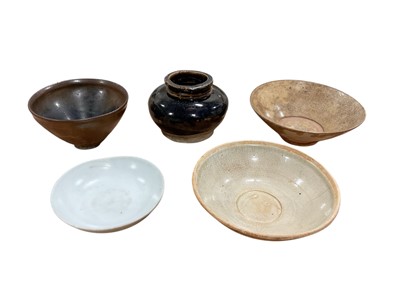 Lot 5025 - Group of antique Chinese ceramics, including a Song style hare's fur glazed bowl, a black glazed jar, and three celadon glazed bowls (5)