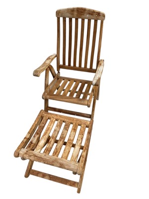 Lot 5345 - Hardwood reclining garden chair and footstool