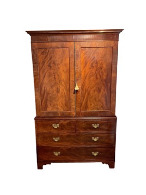 Lot 1274 - George III mahogany linen press