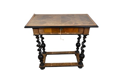 Lot 1283 - William and Mary style oyster veneered side table, with frieze drawer raised on ebonised barley twist supports and bun feet united by stretchers, 85cm wide x 44cm deep x 80cm deep