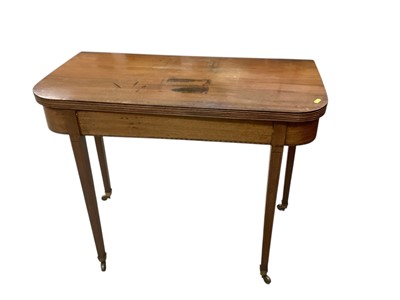 Lot 1353 - George III mahogany tea table with reeded borders, on square taper legs and brass capped castors
