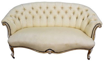 Lot 1299 - 19th century buttoned back sofa with gilt scroll frame and cabriole legs terminating on castors, upholstered in yellow silk