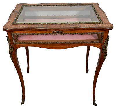 Lot 1297 - Good late 19th century rosewood and marquetry inlaid bijouterie table, with ormolu mounts, the serpentine hinged top with inset bevelled glass, raised on slender cabriole legs, 71cm wide x 51cm...