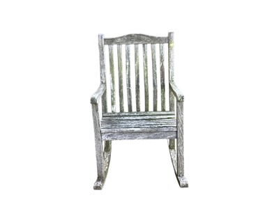 Lot 1393 - Teak garden rocking chair