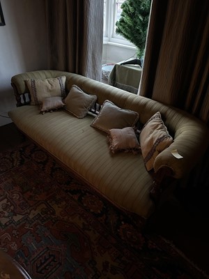 Lot 5373 - Late Victorian walnut framed salon sofa with buttoned roll back, upholstered in green stripe fabric, on turned legs
