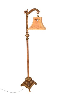 Lot 1257 - Antique gilt lamp with scroll support and fabric covered column