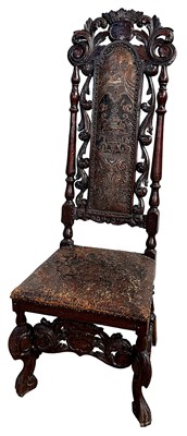 Lot 1407 - Victorian carved oak chair in the Carolean style, with leather embossed back and seat, on carved scroll supports
