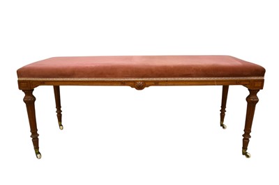 Lot 1308 - 19th century Aesthetic period carved oak window seat, raised on stop-fluted tapered supports and castors, 122cm wide x 42cm deep x 53cm high